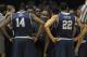 ROSEMONT, IL - JANUARY 17: Head coach John Thompson III of the Georgetown Hoyas gives instructions to players including Henry Sims #14 and Otto Porter #22 during a game against the DePaul Blue Demons at Allstate Arena on January 17, 2012 in Rosemont, Illinois. Georgetown defeated DePaul 83-75. (Photo by Jonathan Daniel/Getty Images)