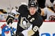 PITTSBURGH, PA - DECEMBER 5: Sidney Crosby #87 of the Pittsburgh Penguins skates with the puck against the Boston Bruins on December 5, 2011 at CONSOL Energy Center in Pittsburgh, Pennsylvania. (Photo by Jamie Sabau/Getty Images)