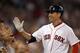 BOSTON, MA - AUGUST 31: Jacoby Ellsbury #2 of the Boston Red Sox is congratulated after he hit a two run homer in the sixth inning against the New York Yankees on August 31, 2011 at Fenway Park in Boston, Massachusetts. (Photo by Elsa/Getty Images)