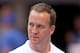 INDIANAPOLIS, IN - OCTOBER 09: Peyton Manning of the Indianapolis Colts watches his team warm up before the NFL game against the Kansas City Chiefs at Lucas Oil Stadium on October 9, 2011 in Indianapolis, Indiana. (Photo by Andy Lyons/Getty Images)
