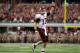 ARLINGTON, TX - OCTOBER 01: Quarterback Ryan Tannehill #17 of the Texas A&M Aggies celebrates a touchdown against the Arkansas Razorbacks at Cowboys Stadium on October 1, 2011 in Arlington, Texas. (Photo by Ronald Martinez/Getty Images)