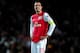 LONDON, ENGLAND - MARCH 06: Robin van Persie of Arsenal looks on dejected at the final whistle during the UEFA Champions League Round of 16 second leg match between Arsenal and AC Milan at Emirates Stadium on March 6, 2012 in London, England. (Photo by Laurence Griffiths/Getty Images)