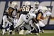 SAN DIEGO, CA - NOVEMBER 10: Defensive lineman Kamerion Wimbley #96 of the Oakland Raiders sacks quarterback Philip Rivers #17 of the San Diego Chargers in the first half at Qualcomm Stadium on November 10, 2011 in San Diego, California. (Photo by Harry How/Getty Images)