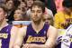 PHOENIX, AZ - FEBRUARY 19: (L-R) Troy Murphy #14, Pau Gasol #18, Derek Fisher #2 and Metta World Peace #15 of the Los Angeles Lakers react on the bench during the final moments of the NBA game against the Phoenix Suns at US Airways Center on February 19, 2012 in Phoenix, Arizona. The Suns defeated the Lakers 102-90. NOTE TO USER: User expressly acknowledges and agrees that, by downloading and or using this photograph, User is consenting to the terms and conditions of the Getty Images License Agreement. (Photo by Christian Petersen/Getty Images)
