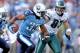 NASHVILLE, TN - OCTOBER 24: Michael Griffin #33 of the Tennessee Titans runs with the ball after intercepting a pass while defended by Brent Celek #87 of the Philadelphia Eagles at LP Field on October 24, 2010 in Nashville, Tennessee. The Titans won 37-19. (Photo by Andy Lyons/Getty Images)
