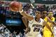 INDIANAPOLIS, IN - MARCH 08: JerShon Cobb #23 of the Northwestern Wildcats attempts to control the ball against the Minnesota Golden Gophers during their first round game of 2012 Big Ten Men's Basketball Conferene Tournament at Bankers Life Fieldhouse on March 8, 2012 in Indianapolis, Indiana. (Photo by Andy Lyons/Getty Images)