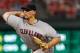 ARLINGTON, TX - SEPTEMBER 13: Justin Masterson #63 of the Cleveland Indians pitches against the Texas Rangers at Rangers Ballpark in Arlington on September 13, 2011 in Arlington, Texas. (Photo by Tom Pennington/Getty Images)