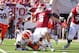BLOOMINGTON, IN - OCTOBER 08: Dusty Kiel #8 of the Indiana Hoosiers attempts a pass while defended by Whitney Mercilus #85 of the Illinois Illini during the game at Memorial Stadium on October 8, 2011 in Bloomington, Indiana. Illinois won 41-20. (Photo by Andy Lyons/Getty Images)