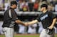 CLEVELAND, OH - JULY 8: Manager John Farrell #52 congratulates Travis Snider #45 of the Toronto Blue Jays after the Blue Jays defeated the Indians 11-7 at Progressive Field on July 8, 2011 in Cleveland, Ohio. (Photo by Jason Miller/Getty Images)