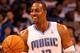 ORLANDO, FL - FEBRUARY 06: Dwight Howard #12 of the Orlando Magic smiles during the game against the Los Angeles Clippers at Amway Center on February 6, 2012 in Orlando, Florida. NOTE TO USER: User expressly acknowledges and agrees that, by downloading and or using this Photograph, user is consenting to the terms and conditions of the Getty Images License Agreement. (Photo by Sam Greenwood/Getty Images)