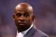 INDIANAPOLIS, IN - FEBRUARY 05: Deion Sanders of the NFL Network watches warmups on the field before the New England Patriots take on the New York Giants in Super Bowl XLVI at Lucas Oil Stadium on February 5, 2012 in Indianapolis, Indiana. (Photo by Elsa/Getty Images)