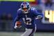 EAST RUTHERFORD, NJ - DECEMBER 27: Steve Smith #12 of the New York Giants runs against the Carolina Panthers at Giants Stadium on December 27, 2009 in East Rutherford, New Jersey. (Photo by Nick Laham/Getty Images)