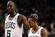 BOSTON, MA - MARCH 06: Kevin Garnett #5 of the Boston Celtics celebrates the win with teammate Rajon Rondo #9 on March 6, 2012 at TD Garden in Boston, Massachusetts. The Boston Celtics defeated the Houston Rockets 97-92 in overtime. NOTE TO USER: User expressly acknowledges and agrees that, by downloading and or using this photograph, User is consenting to the terms and conditions of the Getty Images License Agreement. (Photo by Elsa/Getty Images)