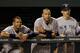BALTIMORE, MD - APRIL 23: Alex Rodriguez #13 of the New York Yankees (L) Derek Jeter #2 (C) and manager Joe Girardi #28 (R) look out from the dugout during the eighth inning of their 15-3 win over the Baltimore Orioles at Oriole Park at Camden Yards on April 23, 2011 in Baltimore, Maryland. (Photo by Rob Carr/Getty Images)