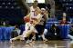 BRIDGEPORT, CT - MARCH 07: Kyle Smyth #33 of the Iona Gaels drives against Nick Leon #22 of the St. Peter's Peacocks during the final of the MAAC men's conference basketball tournment at Webster Bank Arena at Harbor Yard on March 7, 2011 in Bridgeport, Connecticut. (Photo by Chris Chambers/Getty Images)