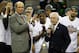 NEW ORLEANS, LA - MARCH 11: Southeastern Conference commissioner Mike Slive presents head coach Kevin Stallings of the Vanderbilt Commodores with the trophy after their 71 to 64 win over the Kentucky Wildcats in the championship game of the 2012 SEC Men's Basketball Tournament at New Orleans Arena on March 11, 2012 in New Orleans, Louisiana. (Photo by Chris Graythen/Getty Images)