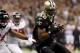 NEW ORLEANS, LA - DECEMBER 26: Wide receiver Marques Colston #12 of the New Orleans Saints catches an eight-yard touchdown pass in the second quarter against the Atlanta Falcons at the Mercedes-Benz Superdome on December 26, 2011 in New Orleans, Louisiana. (Photo by Chris Graythen/Getty Images)