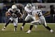 SAN DIEGO, CA - NOVEMBER 10: Vincent Jackson #83 of the San Diego Chargers is met by Matt Giordano #27 and Tyvon Branch #33 of the Oakland Raiders after his catch at Qualcomm Stadium on November 10, 2011 in San Diego, California. (Photo by Harry How/Getty Images)
