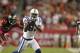 TAMPA, FL - OCTOBER 03: Receiver Reggie Wayne #87 of the Indianapolis Colts catches the ball against E.J. Biggers #31 of the Tampa Bay Buccaneers at Raymond James Stadium on October 3, 2011 in Tampa, Florida. (Photo by Marc Serota/Getty Images)