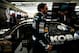 LAS VEGAS, NV - MARCH 09: Jimmie Johnson, driver of the #48 Lowe's/Kobalt Tools Chevrolet, walks in the garage during practice for the NASCAR Sprint Cup Series Kobalt Tools 400 at Las Vegas Motor Speedway on March 9, 2012 in Las Vegas, Nevada. (Photo by Tom Pennington/Getty Images)