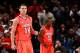 NEW YORK, NY - MARCH 10: Kyle Kuric #14 and Chris Smith #5 of the Louisville Cardinals reacts after a play against the Cincinnati Bearcats during the finals of the Big East Men's Basketball Tournament at Madison Square Garden at Madison Square Garden on March 10, 2012 in New York City. (Photo by Chris Trotman/Getty Images)