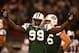 EAST RUTHERFORD, NJ - OCTOBER 15: Bryan Thomas #99 of the New York Jets celebrates Olindo Mare #10 of the Miami Dolphins potential game tying 51 yard field goal miss in the final seconds of their game at Giants Stadium October 15, 2006 in East Rutherford, New Jersey. (Photo by Al Bello/Getty Images)