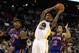 OAKLAND, CA - DECEMBER 28: Monta Ellis #8 of the Golden State Warriors drives between Carmelo Anthony #7 and Landry Fields #2 of the New York Knicks at Oracle Arena on December 28, 2011 in Oakland, California. NOTE TO USER: User expressly acknowledges and agrees that, by downloading and or using this photograph, User is consenting to the terms and conditions of the Getty Images License Agreement. (Photo by Ezra Shaw/Getty Images)