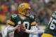 GREEN BAY, WI - JANUARY 01: Matt Flynn #10 of the Green Bay Packerslooks for a receiver as Ndamukong Suh #90 of the Detroit Lions rushes at Lambeau Field on January 1, 2012 in Green Bay, Wisconsin. The Packers defeated the Lions 45-41. (Photo by Jonathan Daniel/Getty Images)