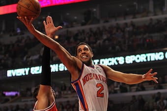 Landry Fields absorbed a hard foul trying to convert a fast break opportunity.