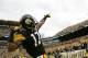 PITTSBURGH, PA - DECEMBER 04: Mike Wallace #17 of the Pittsburgh Steelers celebrates following his touchdown against the Cincinnati Bengals in the first half during the game on December 4, 2011 at Heinz Field in Pittsburgh, Pennsylvania. (Photo by Jared Wickerham/Getty Images)