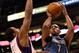 PHOENIX, AZ - MARCH 12: Derrick Williams #7 of the Minnesota Timberwolves puts up a shot over Channing Frye #8 of the Phoenix Suns during the NBA game at US Airways Center on March 12, 2012 in Phoenix, Arizona. NOTE TO USER: User expressly acknowledges and agrees that, by downloading and or using this photograph, User is consenting to the terms and conditions of the Getty Images License Agreement. (Photo by Christian Petersen/Getty Images)