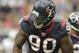 HOUSTON - OCTOBER 09: Outside linebacker Mario Williams #90 of the Houston Texans reacts after a big defensive stop in the first quarter against the Oakland Raiders at Reliant Stadium on October 9, 2011 in Houston, Texas. (Photo by Bob Levey/Getty Images)