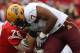 MADISON, WI - SEPTEMBER 18: John Clay #32 of the Wisconsin Badgers is tackled by the fask mask by Vontaze Burfict #7 of the Arizona State Sun Devils at Camp Randall Stadium on September 18, 2010 in Madison, Wisconsin. (Photo by Jonathan Daniel/Getty Images)