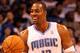 ORLANDO, FL - FEBRUARY 06: Dwight Howard #12 of the Orlando Magic smiles during the game against the Los Angeles Clippers at Amway Center on February 6, 2012 in Orlando, Florida. NOTE TO USER: User expressly acknowledges and agrees that, by downloading and or using this Photograph, user is consenting to the terms and conditions of the Getty Images License Agreement. (Photo by Sam Greenwood/Getty Images)