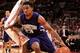 COLUMBUS, OH - DECEMBER 28: JerShon Cobb #23 of the Northwestern Wildcats drives around Shannon Scott #3 of the Ohio State Buckeyes on December 28, 2011 at Value City Arena in Columbus, Ohio. Ohio State defeated Northwestern 87-54. (Photo by Jamie Sabau/Getty Images)