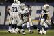 SAN DIEGO, CA - NOVEMBER 10: Defensive lineman Kamerion Wimbley #96 of the Oakland Raiders reacts after he sacks quarterback Philip Rivers #17 of the San Diego Chargers in the first half at Qualcomm Stadium on November 10, 2011 in San Diego, California. (Photo by Harry How/Getty Images)