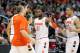 PITTSBURGH, PA - MARCH 17: Scoop Jardine #11 and Brandon Triche #20 of the Syracuse Orange celebrate a play with teammates against the Kansas State Wildcats during the third round of the 2012 NCAA Men's Basketball Tournament at Consol Energy Center on March 17, 2012 in Pittsburgh, Pennsylvania. (Photo by Gregory Shamus/Getty Images)
