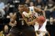 NASHVILLE, TN - MARCH 16: Ian Miller #30 of the Florida State Seminoles drives past Jordan Gathers #5 of the St. Bonaventure Bonnies during the second round of the 2012 NCAA Men's Basketball Tournament at Bridgestone Arena on March 16, 2012 in Nashville, Tennessee. (Photo by Jamie Squire/Getty Images)
