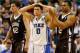 GREENSBORO, NC - MARCH 16: (C) Austin Rivers #0 of the Duke Blue Devils reacts as he stands between Gabe Knutson #42 and B.J. Bailey #32 of the Lehigh Mountain Hawks in the second half during the second round of the 2012 NCAA Men's Basketball Tournament at Greensboro Coliseum on March 16, 2012 in Greensboro, North Carolina. (Photo by Streeter Lecka/Getty Images)