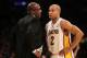 LOS ANGELES, CA - MARCH 11: Head coach Mike Brown of the Los Angeles Lakers talks with Derek Fisher #2 during hte game against the Boston Celtics at Staples Center on March 11, 2012 in Los Angeles, California. The Lakers won 97-94. NOTE TO USER: User expressly acknowledges and agrees that, by downloading and or using this photograph, User is consenting to the terms and conditions of the Getty Images License Agreement. (Photo by Stephen Dunn/Getty Images)