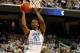 GREENSBORO, NC - MARCH 16: Harrison Barnes #40 of the North Carolina Tar Heels goes to the hoop against Matt Glass #34 of the Vermont Catamounts during the second round of the 2012 NCAA Men's Basketball Tournament at Greensboro Coliseum on March 16, 2012 in Greensboro, North Carolina. (Photo by Streeter Lecka/Getty Images)
