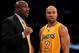 LOS ANGELES, CA - JANUARY 16: Head coach Mike Brown and Derek Fisher #2 of the Los Angeles Lakers confer during the game against the Dallas Mavericks at Staples Center on January 16, 2012 in Los Angeles, California. The Lakers won 73-70. NOTE TO USER: User expressly acknowledges and agrees that, by downloading and or using this photograph, User is consenting to the terms and conditions of the Getty Images License Agreement. (Photo by Stephen Dunn/Getty Images)