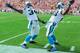 TAMPA, FL - DECEMBER 4: Running backs Jonathan Stewart #28 and DeAngelo Williams #34 of the Carolina Panthers celebrate a touchdown run against the Tampa Bay Buccaneers December 4, 2011 at Raymond James Stadium in Tampa, Florida. (Photo by Al Messerschmidt/Getty Images)
