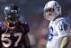 DENVER - SEPTEMBER 26: Quarterback Peyton Manning #18 of the Indianapolis Colts and linebacker Mario Haggan #57 of the Denver Broncos talk during a video replay ruling at INVESCO Field at Mile High on September 26, 2010 in Denver, Colorado. The Colts defeated the Broncos 27-13. (Photo by Doug Pensinger/Getty Images)