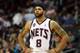 NEWARK, NJ - MARCH 19: Deron Williams #8 of the New Jersey Nets looks on in the first half against the Cleveland Cavaliers at Prudential Center on March 19, 2012 in Newark, New Jersey. NOTE TO USER: User expressly acknowledges and agrees that, by downloading and or using this photograph, User is consenting to the terms and conditions of the Getty Images License Agreement. (Photo by Chris Chambers/Getty Images)