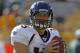 GREEN BAY, WI - OCTOBER 2: Tim Tebow #15 of the Denver Broncos warms up prior to a game against the Green Bay Packers at Lambeau Field on October 2, 2011 in Green Bay, Wisconsin. (Photo by Matt Ludtke /Getty Images)