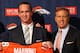 ENGLEWOOD, CO - MARCH 20: Quarterback Peyton Manning (L) poses executive vice president of football operations John Elway (R) during a news conference announcing Manning's contract with the Denver Broncos in the team meeting room at the Paul D. Bowlen Memorial Broncos Centre on March 20, 2012 in Englewood, Colorado. Manning, entering his 15th NFL season, was released by the Indianapolis Colts on March 7, 2012, where he had played his whole career. It has been reported that Manning will sign a five-year, $96 million offer. (Photo by Justin Edmonds/Getty Images)