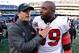 Ryans speaks with Ravens coach John Harbaugh after a 2012 playoff game.
