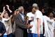 MIAMI, FL - JUNE 12: Bill Russell presents the Bill Russell Finals MVP trophy to Finals MVP Dirk Nowitzki #41 of the Dallas Mavericks after the Mavericks won 105-95 in Game Six of the 2011 NBA Finals at American Airlines Arena on June 12, 2011 in Miami, Florida. NOTE TO USER: User expressly acknowledges and agrees that, by downloading and/or using this Photograph, user is consenting to the terms and conditions of the Getty Images License Agreement. (Photo by Mike Ehrmann/Getty Images)