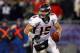 FOXBORO, MA - JANUARY 14: Tim Tebow #15 of the Denver Broncos looks to pass against the New England Patriots during their AFC Divisional Playoff Game at Gillette Stadium on January 14, 2012 in Foxboro, Massachusetts. (Photo by Al Bello/Getty Images)